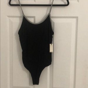 Black bodysuit with adjustable straps. Brand new